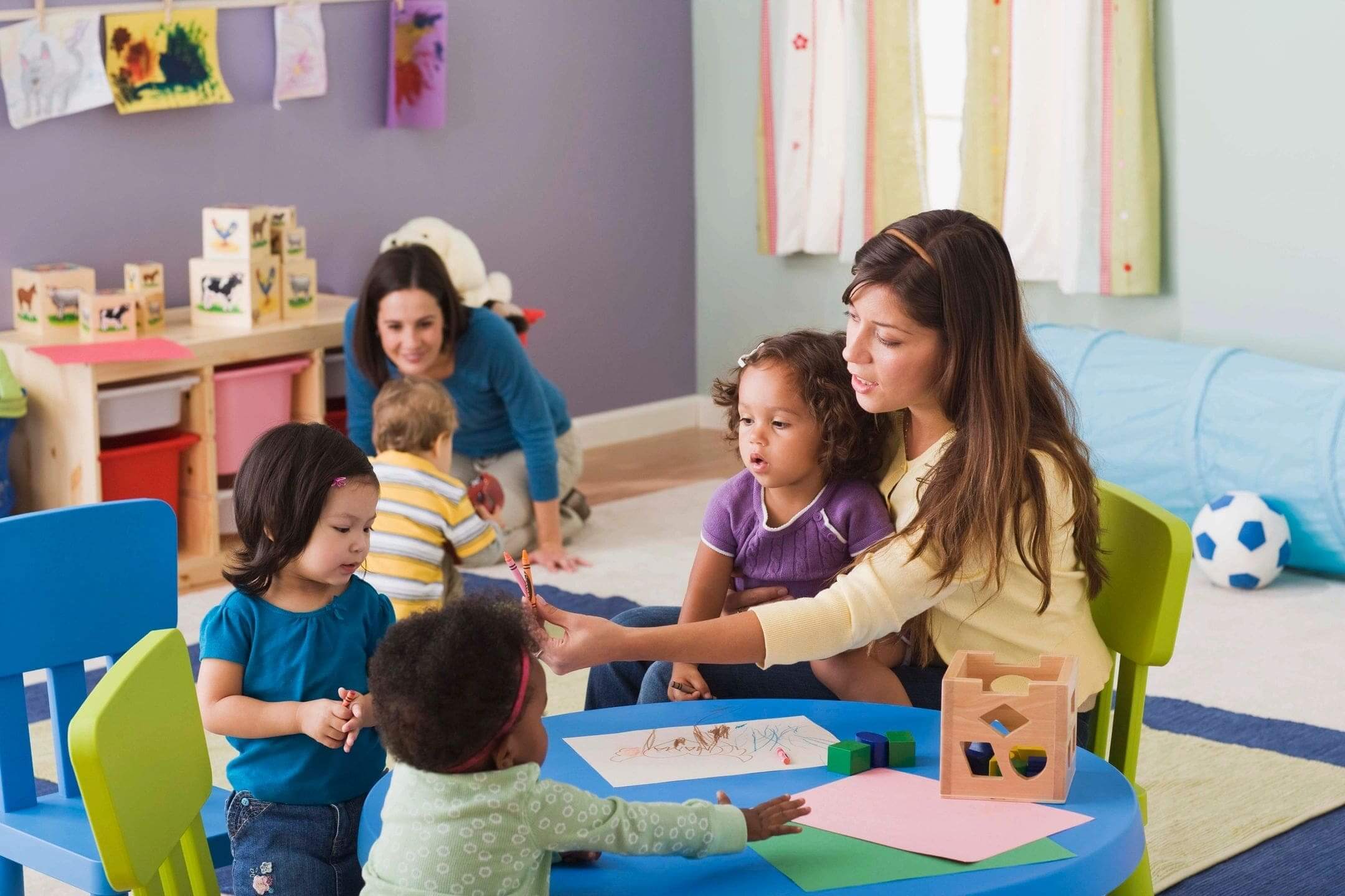 teachers teaching kids in a classroom